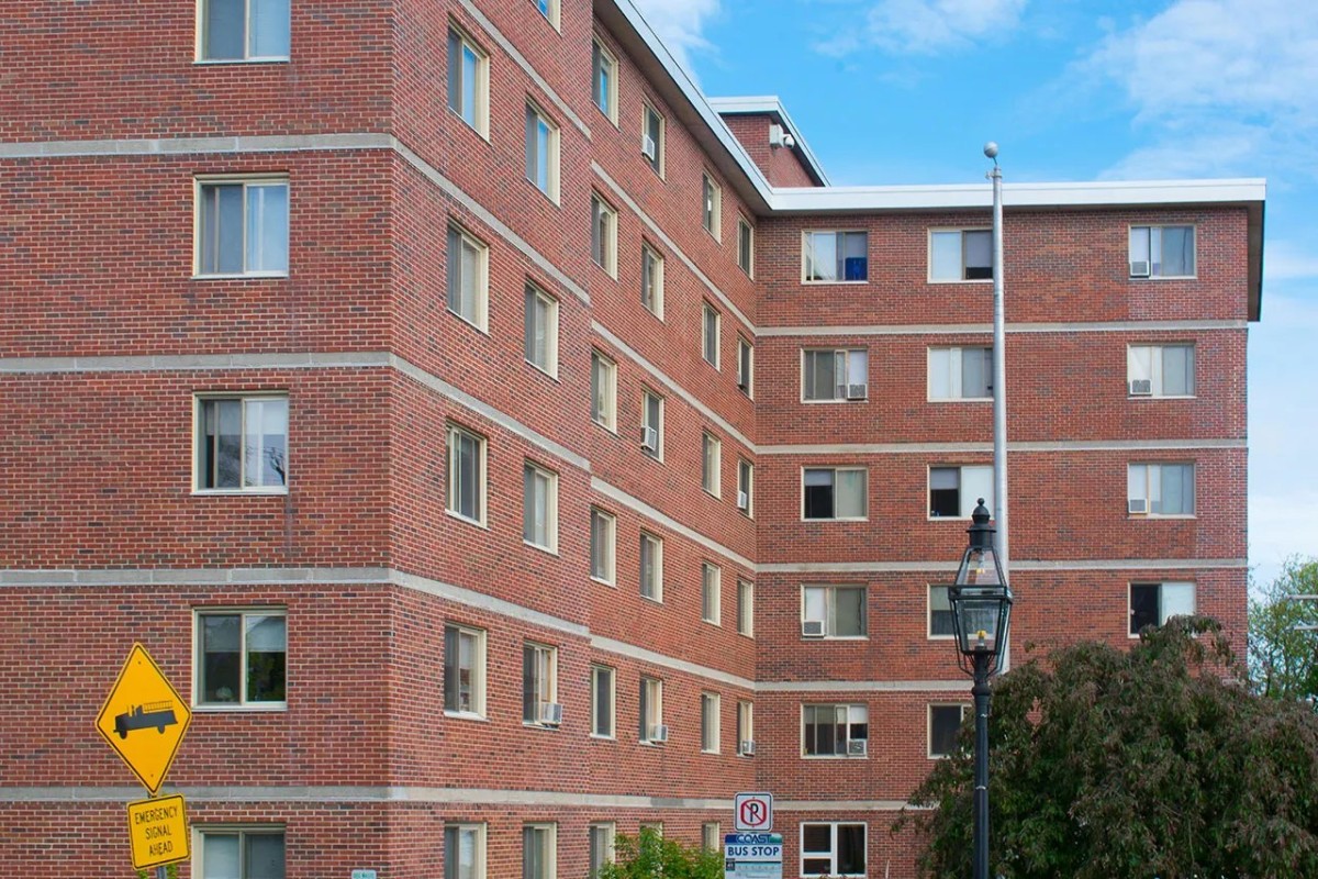 Side of apartment brick building