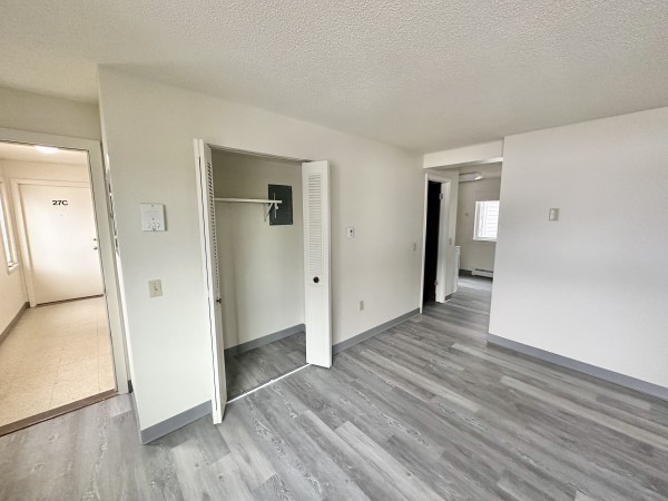 Hallway and closet with utility box
